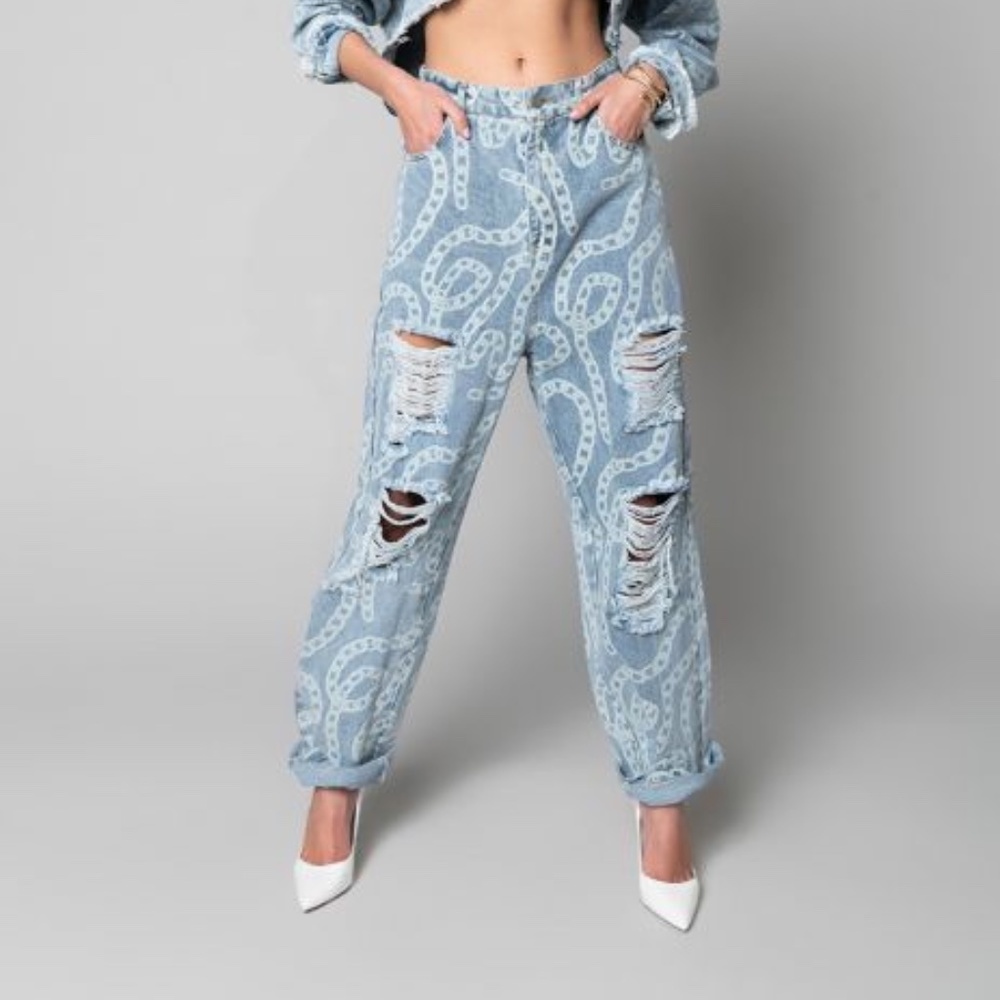 Brand new Akira ripped jeans tag attached